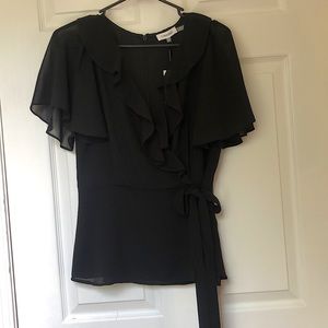 Black Calvin Klein Woman’s dress shirt, size small. New with tags.